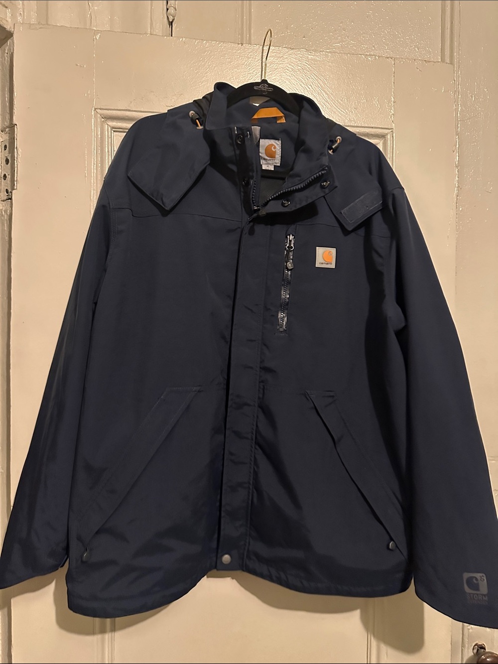 Like New Men’s Carhartt Navy Hooded Rain Jacket with Chest Pocket. Size XL.